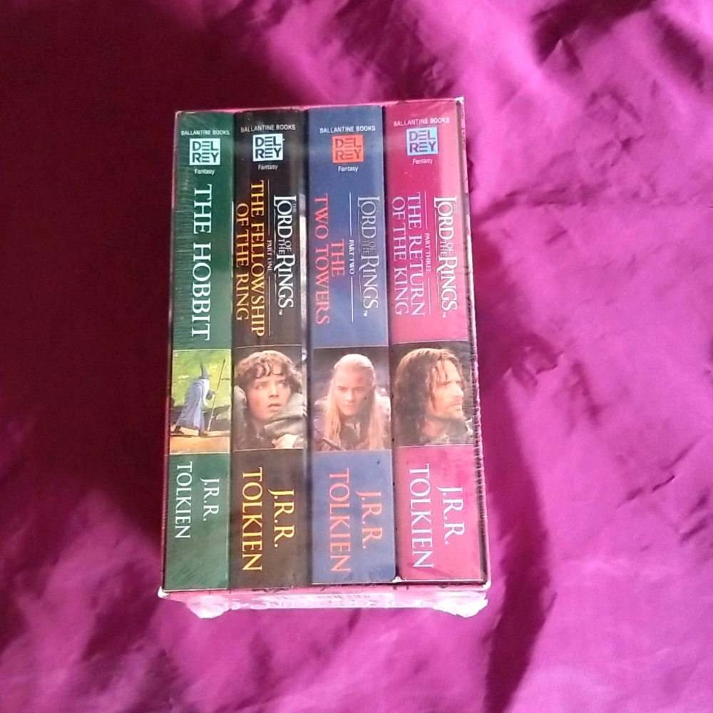 NEW SEALED SLIPCASE WITH FOUR LORD OF THE RINGS BOOKS